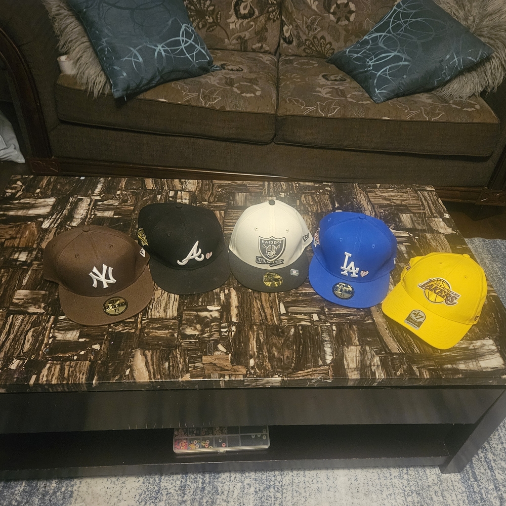 New Era Caps in Brown, Black, White, Blue, and Yellow